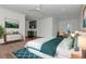 Comfortable bedroom with hardwood floors and a view of the neighborhood at 2050 Hawaii Ne Ave, St Petersburg, FL 33703