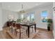 Elegant dining room featuring a chandelier and a view of the outside at 2050 Hawaii Ne Ave, St Petersburg, FL 33703