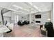 Bright living room with coffered ceilings, fireplace, and elegant decor at 2050 Hawaii Ne Ave, St Petersburg, FL 33703