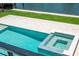 Backyard inground pool and spa with deck and waterfront views make for ideal outdoor enjoyment at 2050 Hawaii Ne Ave, St Petersburg, FL 33703