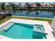 Beautiful backyard pool and hot tub with gorgeous water views of the canal at 2050 Hawaii Ne Ave, St Petersburg, FL 33703