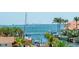 Picturesque view of the waterfront with yachts, palm trees, and the city skyline in the background at 2050 Hawaii Ne Ave, St Petersburg, FL 33703