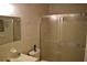 Bathroom features a shower with glass door, toilet, and sink at 2284 Philippine Dr # 41, Clearwater, FL 33763