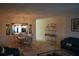 Open dining space featuring decorative mirror and classic chandelier lighting at 2284 Philippine Dr # 41, Clearwater, FL 33763
