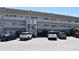 Attractive condo building featuring exterior stairs and ample parking at 2284 Philippine Dr # 41, Clearwater, FL 33763