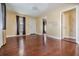 Living room featuring wood floors and lots of natural light at 2414 W State St, Tampa, FL 33609