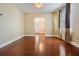 Spacious living room featuring wood-look floors and light walls at 2414 W State St, Tampa, FL 33609