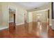 An open floorplan living room showcasing wood-look floors at 2414 W State St, Tampa, FL 33609