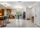 Open floor plan with an eat in kitchen that includes an entry to the home at 2755 Merlin Way, Clearwater, FL 33761