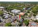 Aerial view of townhouse community, with a pool, well-kept landscaping and close to the water at 2920 W El Prado Blvd # 4, Tampa, FL 33629