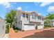 Stunning townhome boasts a private two-car garage and a beautifully landscaped exterior at 2920 W El Prado Blvd # 4, Tampa, FL 33629