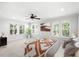 Bright main bedroom with plenty of windows, and decorative art at 2920 W El Prado Blvd # 4, Tampa, FL 33629