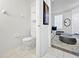 A bathroom that connects to a living area at 30132 Wellesley Way, Wesley Chapel, FL 33543