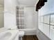 Bright bathroom features a tub/shower, vanity, and window at 30132 Wellesley Way, Wesley Chapel, FL 33543