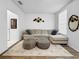 Living room with lots of natural light and stylish decor at 30132 Wellesley Way, Wesley Chapel, FL 33543