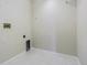 Empty laundry room with tile floor at 3138 Clover Blossom Cir, Land O Lakes, FL 34638