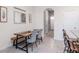 Eat-in dining area with tile floors and decorative lighting fixtures at 34355 Sorrel Mint Dr, Wesley Chapel, FL 33543