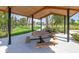 Picnic pavilion featuring two picnic tables with bench seating at 3707 Forest Path Dr, Plant City, FL 33565