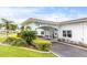 Charming 'Mainlands 3' clubhouse with well-maintained landscaping and tile roof at 3808 97Th N Ave, Pinellas Park, FL 33782