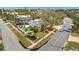Lovely home with great curb appeal featuring a spacious yard, mature trees, and convenient street access at 4151 Belle Vista Dr, St Pete Beach, FL 33706