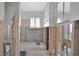Bathroom awaiting renovation, featuring natural light from a window at 4151 Belle Vista Dr, St Pete Beach, FL 33706