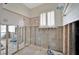Bathroom with tile and exposed block walls awaiting renovation at 4151 Belle Vista Dr, St Pete Beach, FL 33706