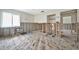 Spacious bedroom awaiting renovation, featuring exposed walls, a ceiling fan and closet at 4151 Belle Vista Dr, St Pete Beach, FL 33706