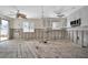 Renovation-ready kitchen with natural light, ceiling fans, and modern cabinetry awaiting new life at 4151 Belle Vista Dr, St Pete Beach, FL 33706
