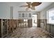 Kitchen area with exposed frame and original wood floors at 4151 Belle Vista Dr, St Pete Beach, FL 33706