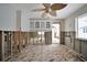 Kitchen area with exposed frame and original wood floors at 4151 Belle Vista Dr, St Pete Beach, FL 33706