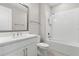 Bathroom with a white vanity, subway tile shower, and modern fixtures at 4600 Lagona Ln, Wesley Chapel, FL 33543