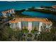Stunning aerial view of condo building with manicured grounds and beautiful bay views at 4801 Osprey S Dr # 508, St Petersburg, FL 33711