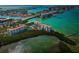 Breathtaking aerial view of waterfront condos, a bridge, and a vibrant coastal community at 4801 Osprey S Dr # 508, St Petersburg, FL 33711