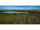 Scenic aerial view of lush mangrove wetlands, waterway and condominium buildings at 4801 Osprey S Dr # 508, St Petersburg, FL 33711