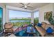 Relaxing waterfront balcony with comfortable seating and scenic views at 4801 Osprey S Dr # 508, St Petersburg, FL 33711