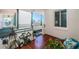 View of covered balcony with outdoor seating and potted plants at 4801 Osprey S Dr # 508, St Petersburg, FL 33711