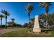 Dolphin Cay entrance sign featuring lush landscaping, palm trees and blue sky at 4801 Osprey S Dr # 508, St Petersburg, FL 33711