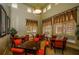Cozy game room with multiple tables, chairs, and natural light streaming through the large windows at 4801 Osprey S Dr # 508, St Petersburg, FL 33711