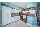 Kitchen features granite countertops, tile backsplash and stainless steel appliances at 4801 Osprey S Dr # 508, St Petersburg, FL 33711