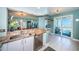 Kitchen features stainless steel appliances, granite countertops and adjacent breakfast bar at 4801 Osprey S Dr # 508, St Petersburg, FL 33711