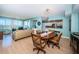 Bright living and dining area boasts floor to ceiling windows and views of the waterway at 4801 Osprey S Dr # 508, St Petersburg, FL 33711