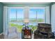 Bright living room featuring water views and cozy seating at 4801 Osprey S Dr # 508, St Petersburg, FL 33711