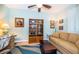 Cozy living room space with a comfortable sofa, bookshelf, and a soothing ambiance at 4801 Osprey S Dr # 508, St Petersburg, FL 33711