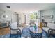 Inviting lobby area with comfortable seating, tile flooring, and direct access to elevators at 4801 Osprey S Dr # 508, St Petersburg, FL 33711