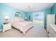 The main bedroom has waterfront views and calming blue paint at 4801 Osprey S Dr # 508, St Petersburg, FL 33711