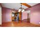 View of dining room with access to the kitchen featuring stainless steel appliances and decorative light fixture at 5010 45Th N Ave, St Petersburg, FL 33709