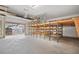 Spacious garage with high ceilings, storage racks, and an open door, ideal for organization and convenience at 5010 45Th N Ave, St Petersburg, FL 33709