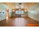 Spacious living room with wood-look floors, custom ceiling and a cozy fireplace at 5010 45Th N Ave, St Petersburg, FL 33709