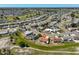Areal view of community with single Gathering homes in a landscaped neighborhood with community features at 607 Fox Hills Dr, Sun City Center, FL 33573