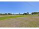 Expansive manicured lawn, perfect for outdoor activities and enjoying the surrounding nature at 607 Fox Hills Dr, Sun City Center, FL 33573